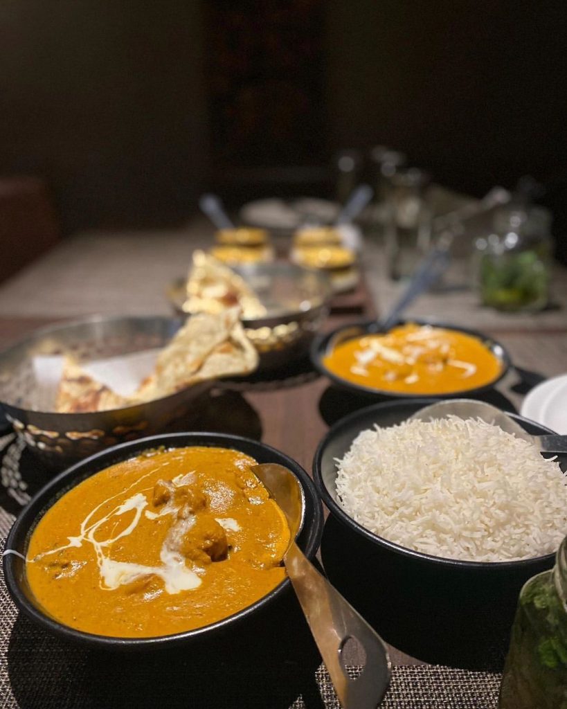 Steamed rice and butter chicken at Spice Route