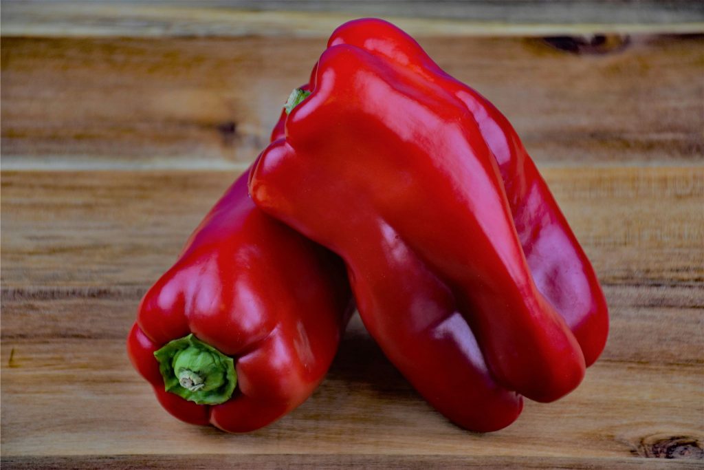 Two red bell peppers